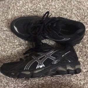 Black ASICS running shoes